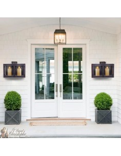 Grey-black wrought iron wall lantern with 2 candles